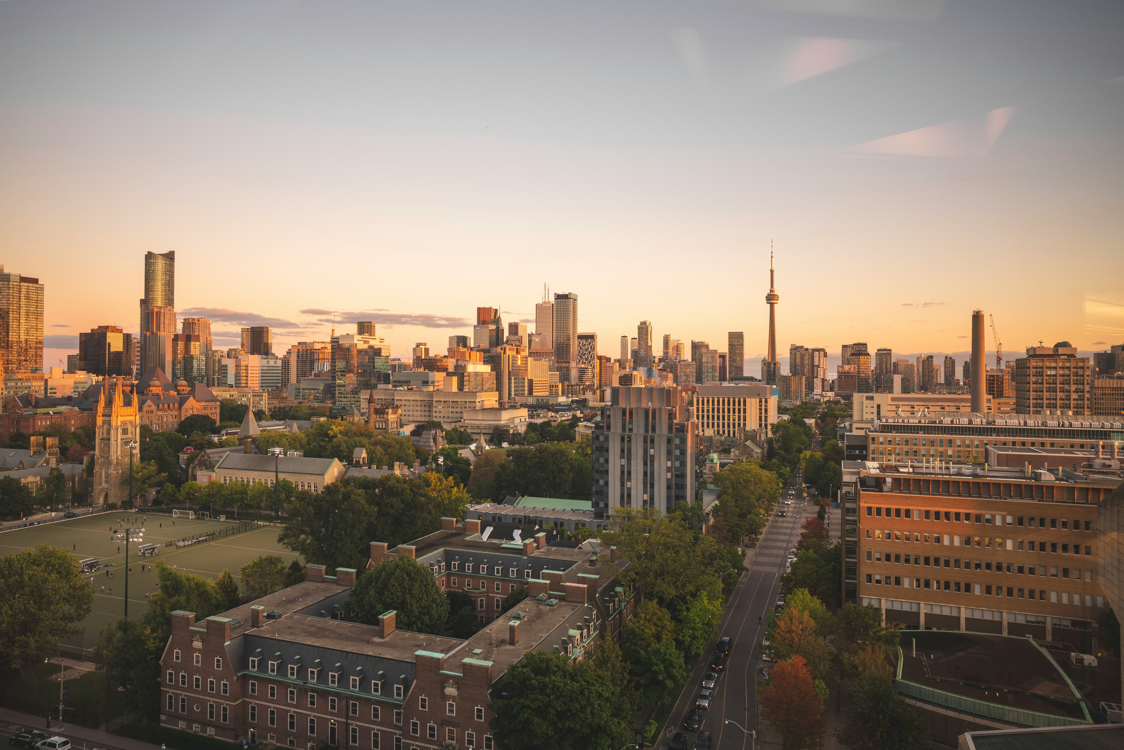 University of Toronto historic campus buildings surrounded by autumn foliage in downtown Toronto